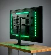A USB LED tape light kit shown mounted on the back of a computer monitor