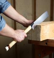 A rip-tooth kataba being used to create a tenon on the end of a large beam