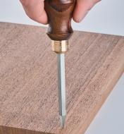 Marking a drill center in wood with a Czeck Edge Birdcage Awl