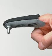 Fingertip Magnet on a finger, with a bolt clinging to the magnet