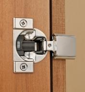 Compact Blumotion 105° Half-Overlay Hinge installed in a cabinet door