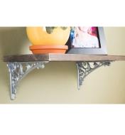 Two Classico Tumbled Nickel Shelf Brackets mounted to a shelf on a wall