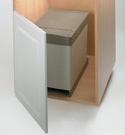 Waste container fully retracted into the cabinet