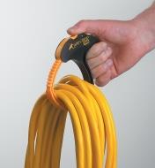Looped electrical cord secured by a large CableClamp