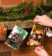 Hanging cards on a mantel using the Card Clothesline