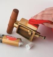 Polishing a brass nut cracker mechanism