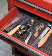 Anti-Corrosion Liner in the drawer of a tool chest, with tools on top