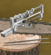 Deluxe Chain-Saw Sharpener clamped to a chain-saw bar