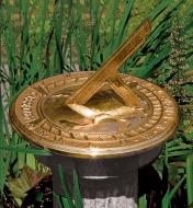 Bronze Sundial on a pedestal in the garden