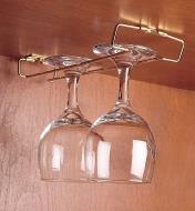 Wine glasses hanging on an installed 9" Brass Rack