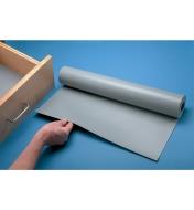 Unrolling a roll of Drawer/Shelf Liner