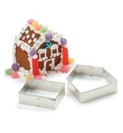 Gingerbread House Cookie Cutter Set beside a completed gingerbread house