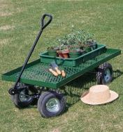 Garden Wagon holding gardening tools and a tray filled with seedling pots