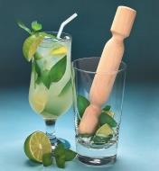 Using the Muddler/Pestle to mash lime and mint in a glass