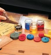 Examples of wooden toy parts colored with aniline dyes