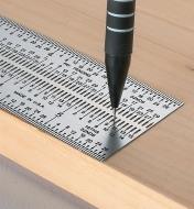 Marking a board with an Incra Marking Rule and a pencil