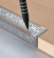 Using an Incra Rigid Bend Rule and a pencil to mark the edge of a board