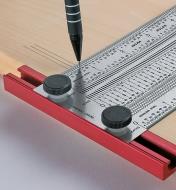 Marking lines on a board using an Incra T-Rule and a pencil