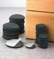 Two sizes of High-Friction Grip Discs piled beside a box 
