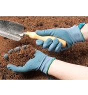 Digging in soil wearing the Lightweight Nitrile Gripper Gloves