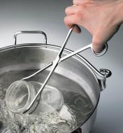 Removing canning jars from boiling water using Kitchen Tongs