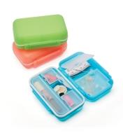 Three Locking Pocket Cases: two closed and one open, filled with sewing supplies