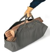 Lee Valley Firewood Tote filled with firewood, being picked up by the handles