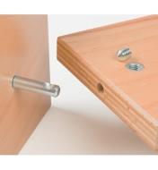 Dowel pin and cross dowel installed in a joint before assembly