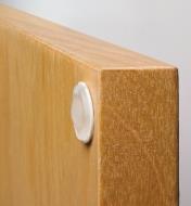 Press-In Soft Bumper mounted to the inside corner of a cabinet door