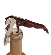 Corkscrew inserted into the cork in a bottle