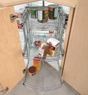 Pull-Out Corner Carousel installed in a cabinet, rotated to the back, with the baskets pulled out