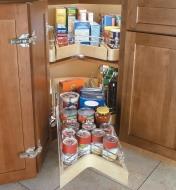Example of kidney shelf installed in a corner kitchen cabinet, with bottom shelf pulled out