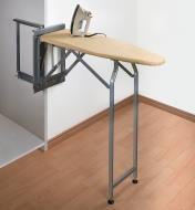 Pull-Out Ironing Board in lowered position, resting on its hinged legs