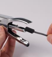 Replacing the staple pusher in the stapler after loading staples 