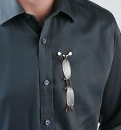 Glasses hanging from a ReadeRest attached to a button-up shirt