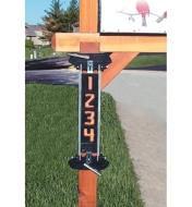 Router letter template set mounted to a mailbox post