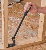 Prying a joist from a bottom plate using the 16" Swivel-Foot Pry Bar
