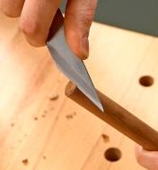 Chamfering a dowel with the Japanese woodworking knife