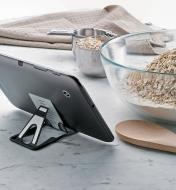 QuikStand holding a tablet next to baking ingredients