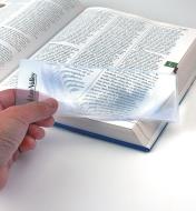 Enlarging text in a book with a Bookmark Magnifier