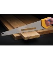 Using a Professional Handsaw to cross cut a rough board to size