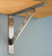 Flat Steel Shelf Bracket mounted under a shelf on a wall
