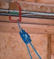 Tie Boss attached to a hook in a garage ceiling