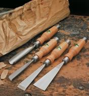 Sculpting Tools lying next to a wood carving