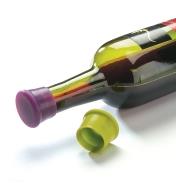 A silicone Wine-Bottle Cap fitted onto a wine bottle, beside an unused cap