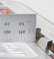Using end graduations on a rule to measure table saw blade height