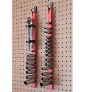 Socket organizer rails, with optional accessory holders installed, hung on a pegboard with sockets, socket wrench and extender securely stored.