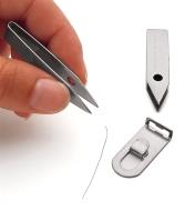 Using Sliver Gripper Tweezers to pick up a hair
