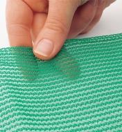 Close-up of tight-knit green material
