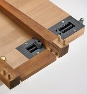 Inset vise being used to disassemble the legs of a small table
